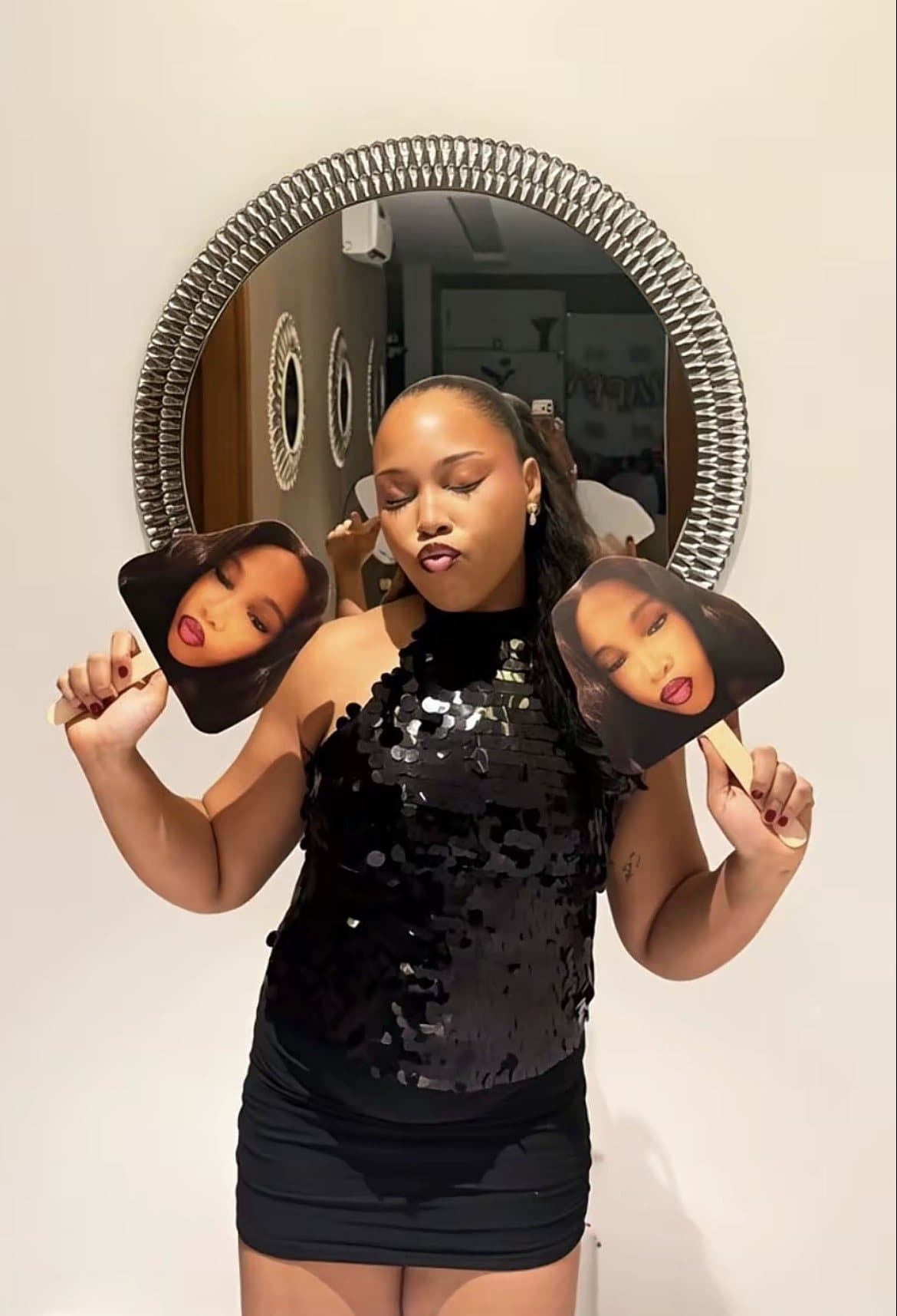 Friends posing with custom photo props
