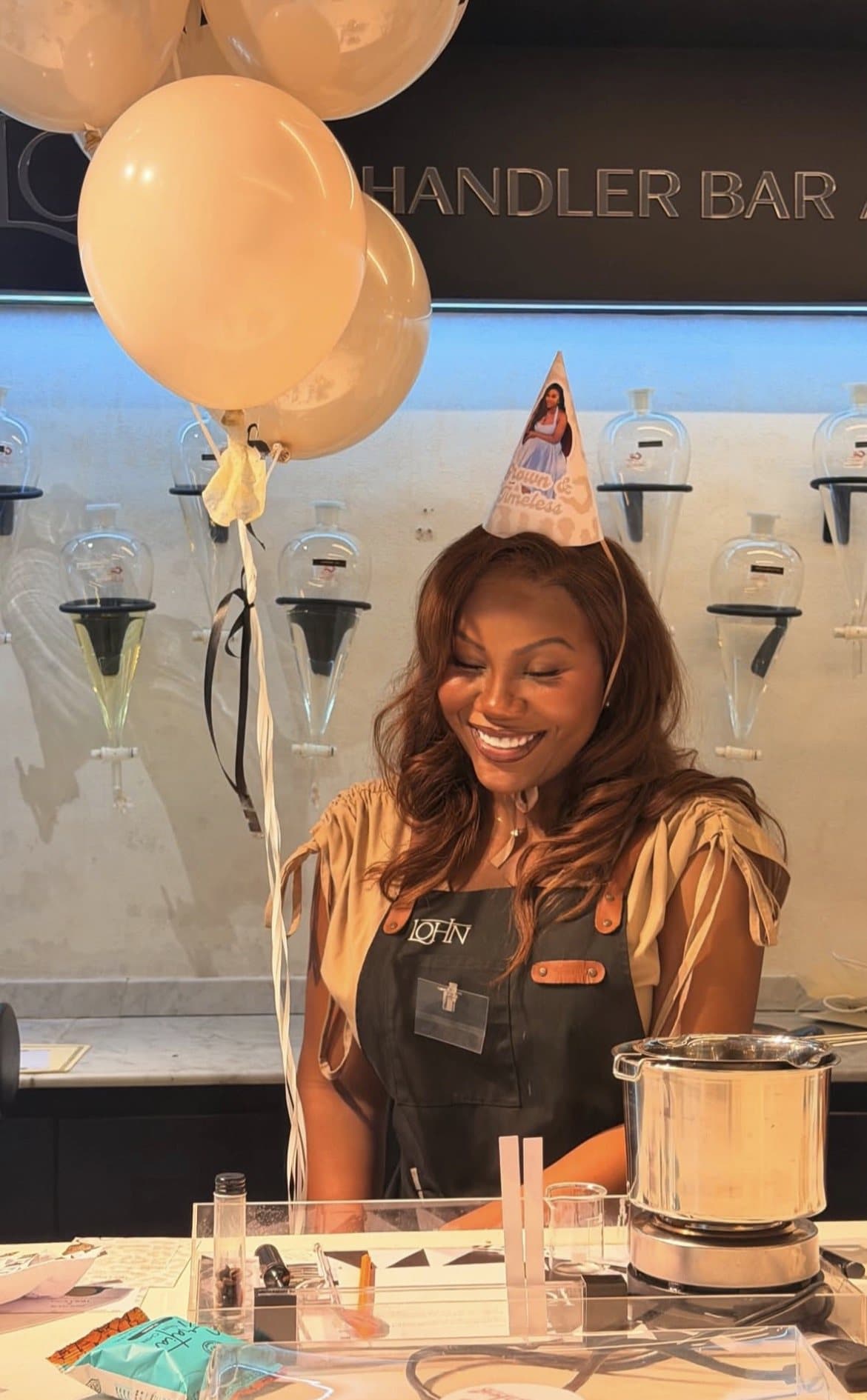 Guest celebrating with a balloon party hat