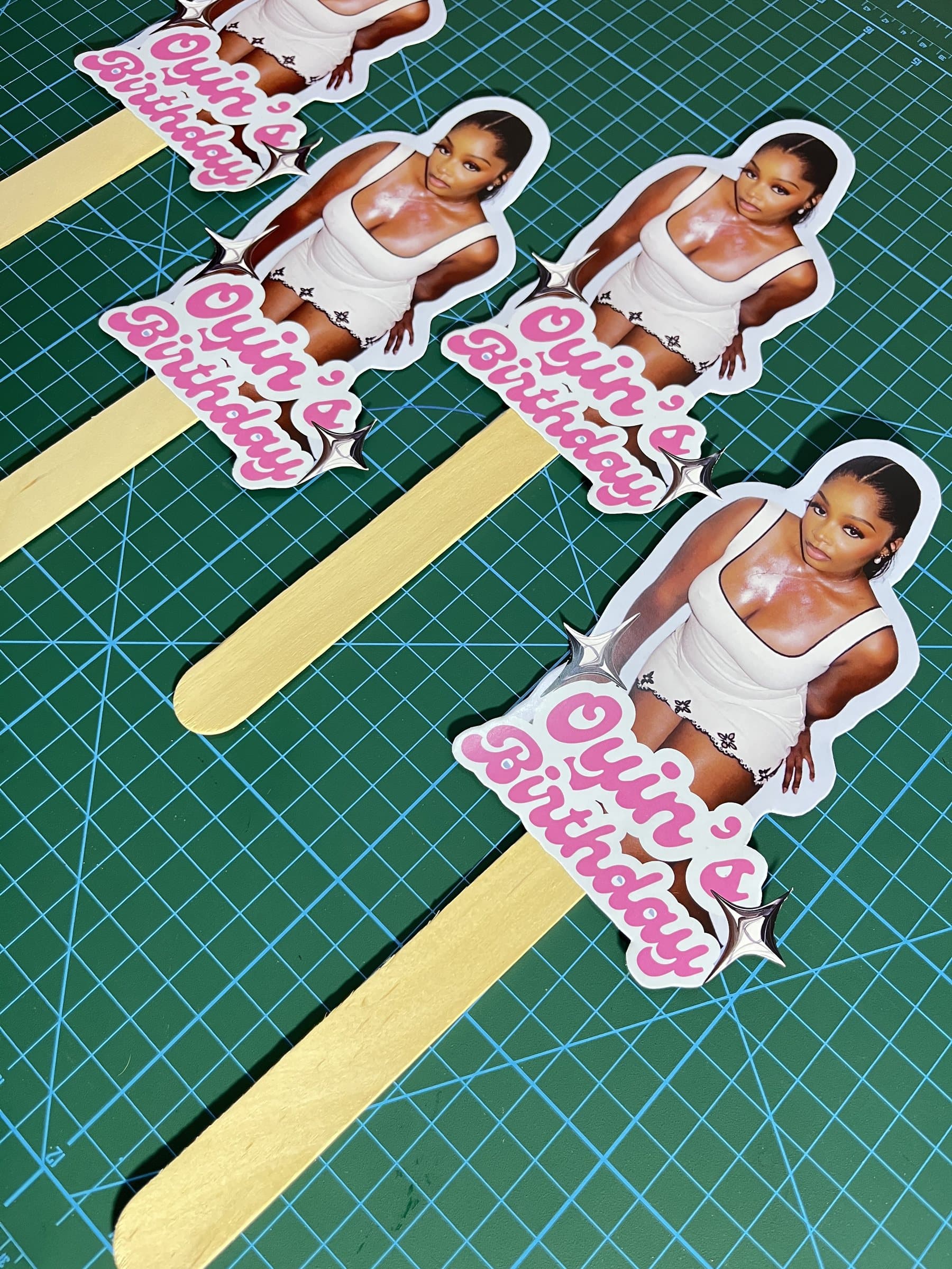 Custom photo cake toppers on wooden picks