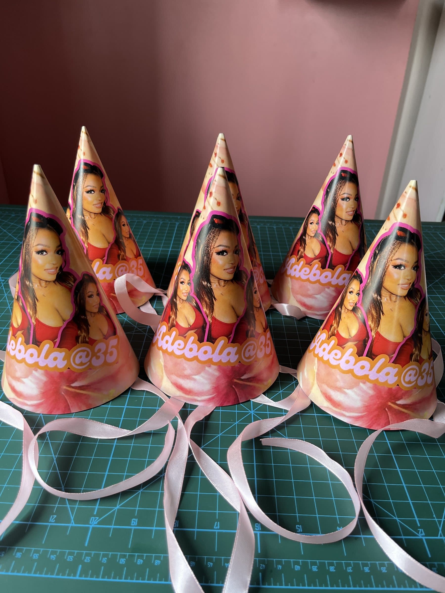 Personalised photo party hats, flat-laid