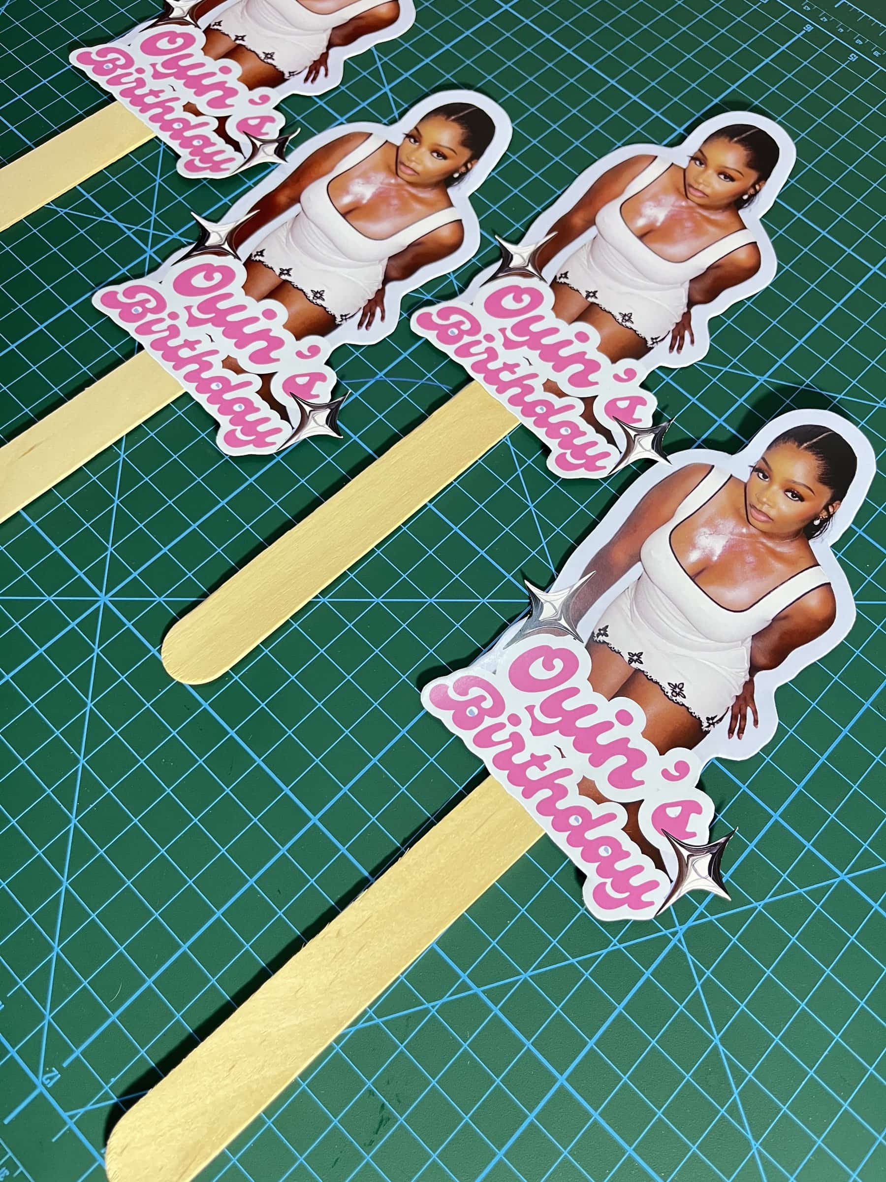 Custom photo cake toppers on wooden picks