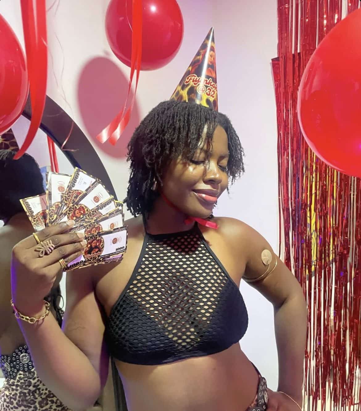 Guest celebrating in a Ruve's custom party hat